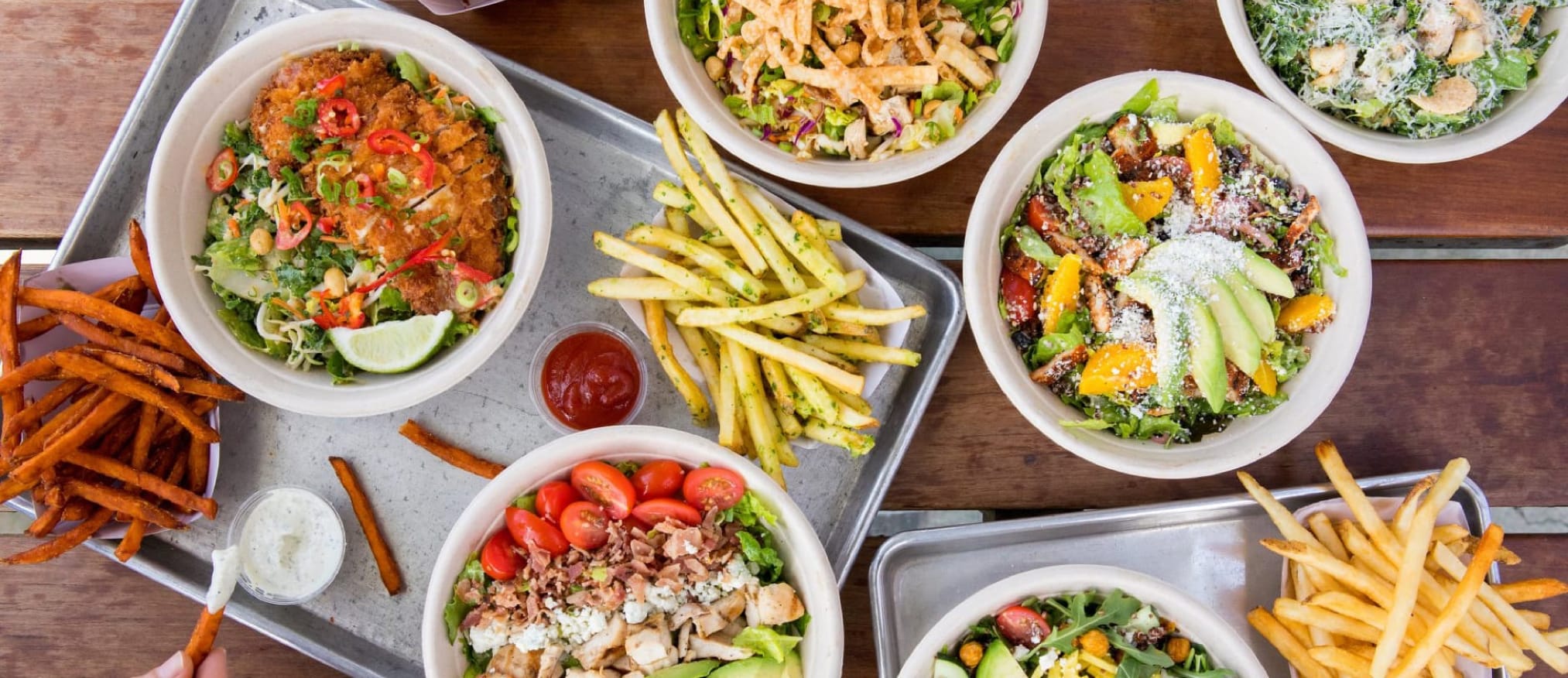 variety of salads with french fries