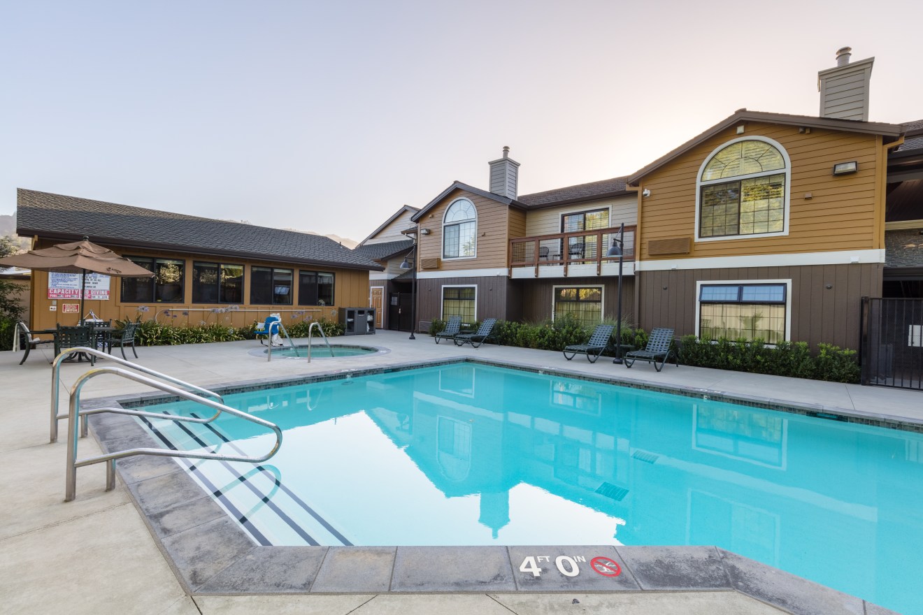 pool and manor in background